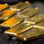 Ouro fecha em alta com foco no Fed e CPI; metal supera US$ 4.400